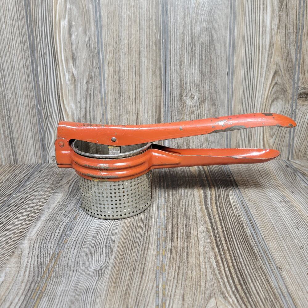 Vintage Handy Things Potato Ricer Red Metal Juicer Press Ludington Michigan MI